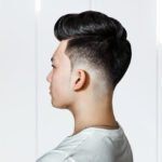 Young,Guy,Brunette,With,Pompadour,Volume,Haircut,50s,-,60s.
